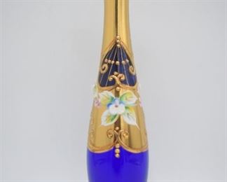 Small Blue Glass Vase with Floral Accents and Metal Trim 