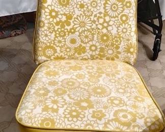 Flower Power yellow and white swivel chair.