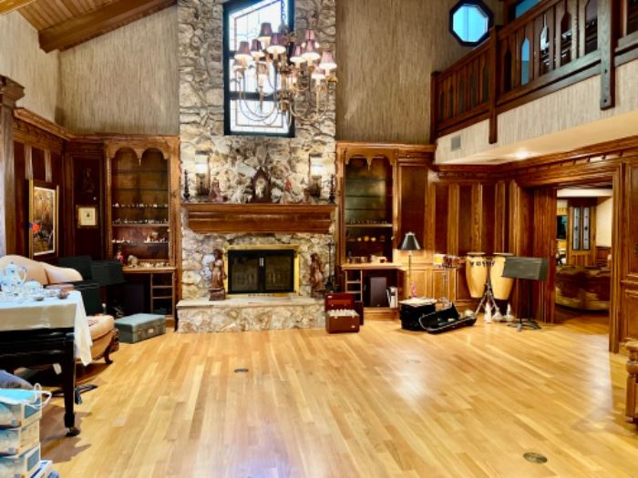 Great room with musical instruments, glass, carvings, Swarovski, etc