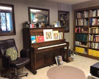 Player piano, books, office chair, mirrored bar/ Coke/ advertising  signs