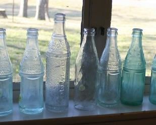 ANTIQUE SODA BOTTLES