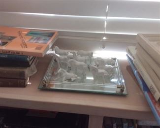 Small horse figurines on vintage tray