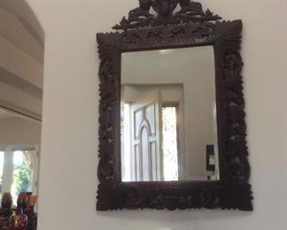 Carved wood mirror