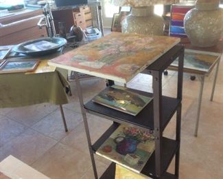 Utility cart with paintings