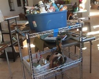 Utility cart with pottery, art supplies
