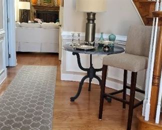Entryway table, lamp and bar height chair, sterling silver candlesticks, silverplate trays