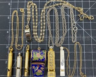 Lot of whistle pendants