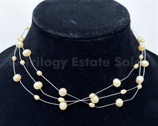 Floating pearl necklace