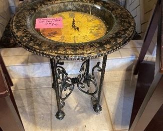 Wrought iron base clock table under glass