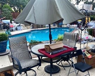 Patio table with 4 chairs and new umbrella