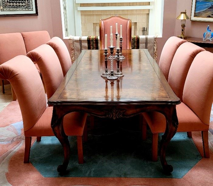 Custom Dining room suite, with 12 large uphostered chairs and amazing grand dining room table.