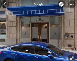 located at the Muse Lofts. Entrance is located on  1 Walton Street under this blue Awning. 