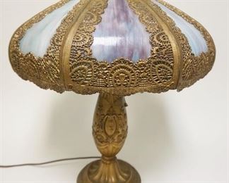 1007	ANTIQUE SLAG GLASS LAMP HAS 8 PANELS APP. 23 IN H 
