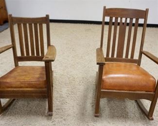 1037	PAIR OF MISSION SOLID OAK ROCKERS W/LEATHER SEATS
