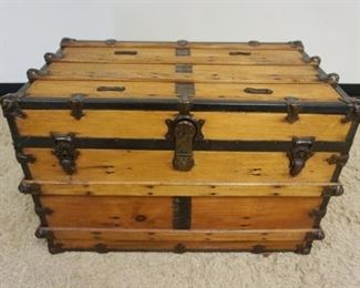 1042	ANTIQUE WOOD STORAGE TRUNK APPROXIMATLEY 35 IN X 20 IN X 23 IN HIGH
