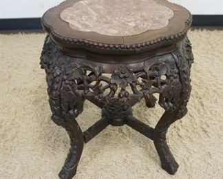 1048	ANTIQUE CARVED MARBLE TOP ASIAN STAND W/ROSE COLORED INSET MARBLE TOP, APPROXIMATELY 21 IN WIDE X 19 IN HIGH
