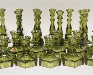 1077	21 OLIVE GREEN FOSTORIA CANDLESTICKS TWO SIZES, TALLEST 8 1/4 IN H 
