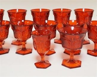 1083	13 PIECES OF RUBY RED FOSTORIA COIN GLASS LOT INCLUDES GOBLETS, TUMBLER, SHERBERTS & A WINE GLASS. TALLEST 6 1/2 IN H 
