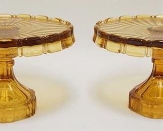 1084	2 AMBER FOSTORIA COIN GLASS CAKE STANDS. 7 1/4 IN H 
