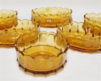 1114	6 AMBER FOSTORIA COIN GLASS BOWLS. FIVE ARE OVAL, ONE IS ROUND. OVAL BOWLS 9 IN 
