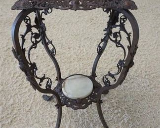 1136	ORNATE METAL PLANT STAND, TOP IS 15 IN SQUARE X 30 IN HIGH
