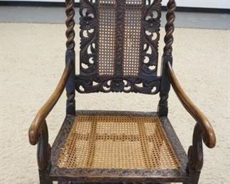 1157	CARVED ARMCHAIR W/TWIST COLUMNS, CARVED FRONT STRETCHER, CANED SEAT & BACK
