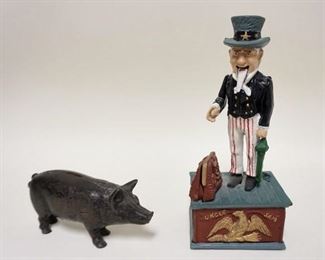 1159	2 IRON BANKS, ANTIQUE PIG STILL BANK & COMTEMPORARY UNCLE SAM MECHANICAL BANK, 10 1/4 IN HIGH
