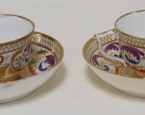 1161	2 EARLY ROYAL CROWN DERBY CUP & SAUCER SETS
