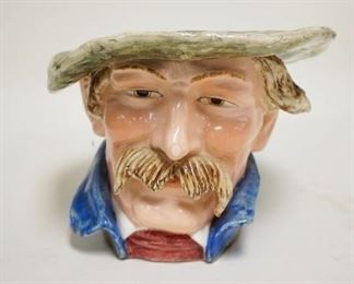1186	FIGURAL PLANTER, MAN W/MOUSTACHE, CHIPS ON ONE SIDE OF THE COLLAR, HAS UNDERGLAZE NUMBERS 8613, 6 IN HIGH

