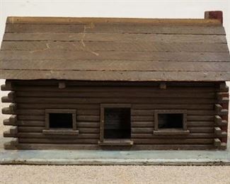 1216	MODEL LOG CABIN, BACK OF ROOF LIFTS UP, BASE IS 33 1/4 IN X 13 IN, 19 IN HIGH
