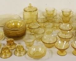 1303	TABLE LOT OF AMBER MADRID DEPRESSION GLASS, INCLUDES GRILL PLATES, DINNER PLATES, SOUP BOWLS, COOKIE JAR, ETC

