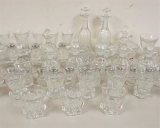 1318	LARGE LOT OF CLEAR FOSTORIA COIN GLASS, DECANTERS, CRUETS, SALT & PEPPER SHAKERS, TUMBLERS, ETC
