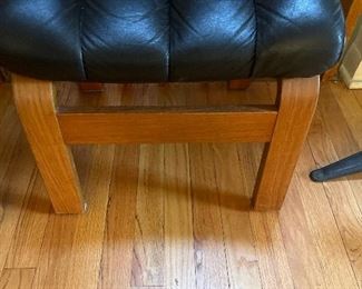 Ottomans one of a pair that match bent wood and black leather arm chairs