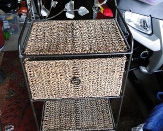 Wicker and metal Storage $20 some frays. Solid overall located in Carmel