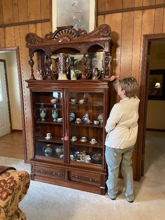 Victorian bookcase cabinet with over the top mirror from New Orleans