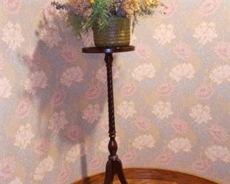 Floral arrangement on plant stand