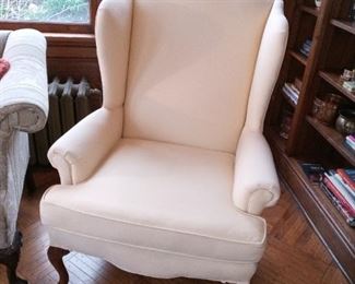 Beige wingback chair