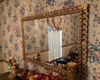Heavy gold framed mirror 