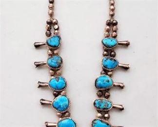 Navajo turquoise and silver squash blossom necklace.