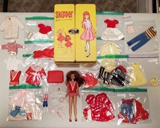 1960s Skipper Barbie Doll With Case & Clothing. Skipper (Barbie's little sister) with doll case containing lots of  Skipper clothes. Outfits include Can You Play, Learning to Ride, Flower Girl, Silk n Fancy, Red Sensation, Red Blush, etc. Outfits may not be complete.