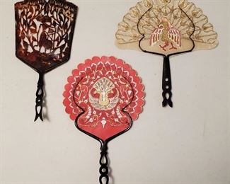 3 Antique Pierced Vellum & Bone Hand Fans Java. Decorated with birds and Wayang figures. Hard to find in this excellent condition. The body of two of the fans is pierced buffalo vellum. The body of the other is faux tortoise. Fishtail handles are carved buffalo bone. All three date to the 1890s-1930s. They measure 10 1/2" and 11 1/2".