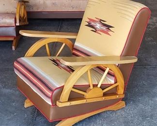 Mid century wagon wheel platform rocker upholstered in an authentic Chimayo weaving