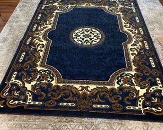 Area rug - 7’x 5’ 1/4”