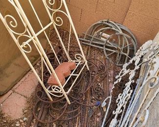 various metal parts and glass patio table