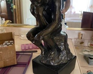 bronze thinking man