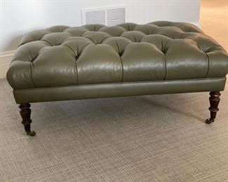 Moss Green Tufted Leather Ottoman on Casters. Measures 24" x 30" x 19" H. Photo 1 of 3. 