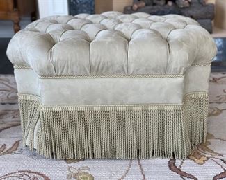 Ultra Suede Upholstered Tufted Ottoman with Fringe Trim. Photo 1 of 2. 
