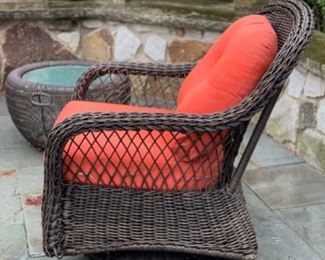 Set of four all weather woven wicker swivel rocker chairs with new cushions.  Photo 2 of 2. 