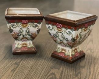 Pair of decorative planters. Each measures 7.5” x 8”. 