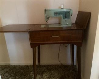 Singer sewing machine,  sewing accessories & fabric